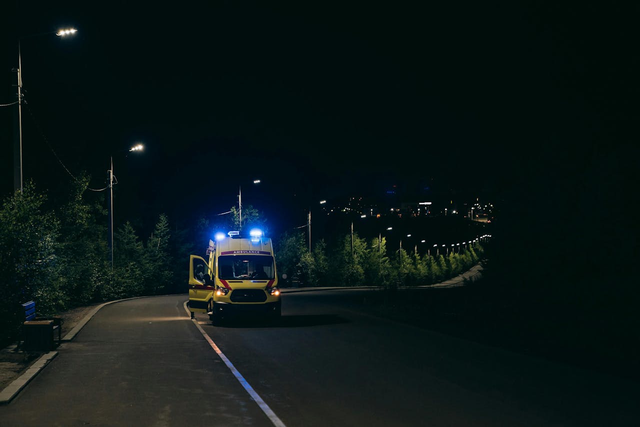 Ambulance on Road at Night